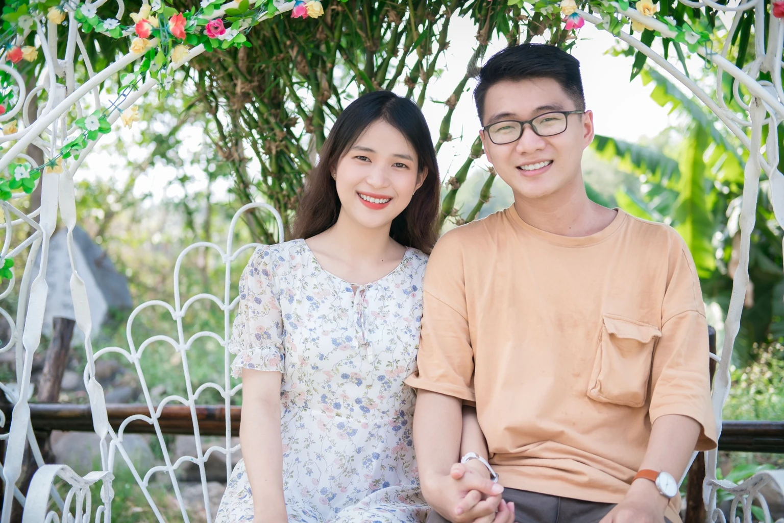 Emotional portrait of couple embracing in scenic autumn park setting with natural lighting